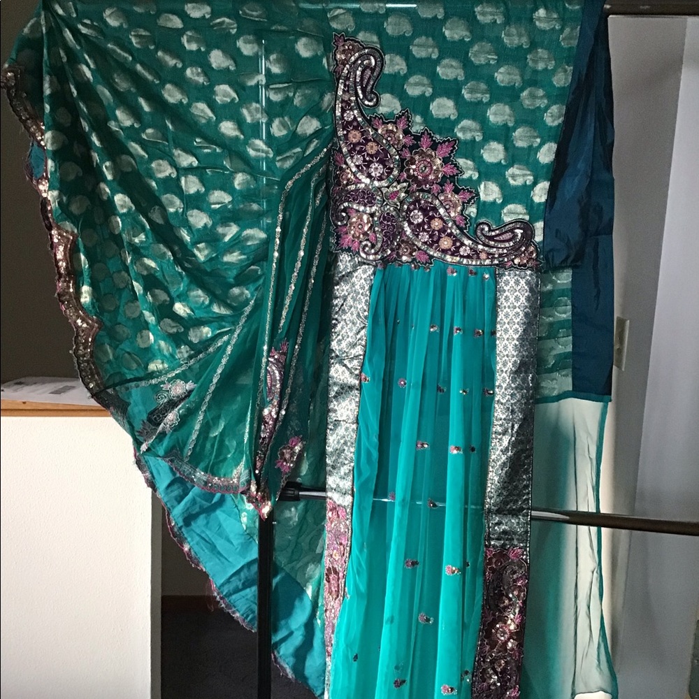 Elegant stitched wrap around. Party wedding saree